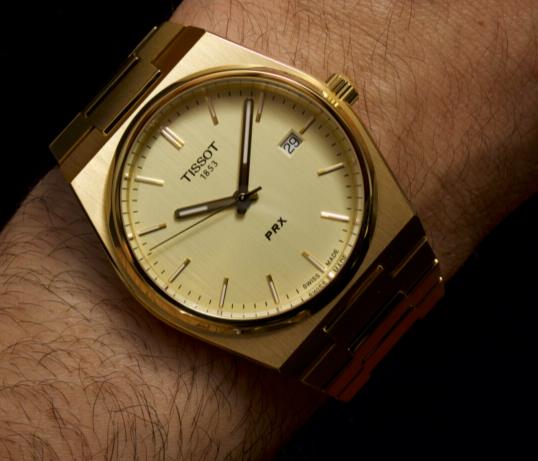 天梭手表推出 PRX 40 毫米和 35 毫米金色调腕表（图2）
